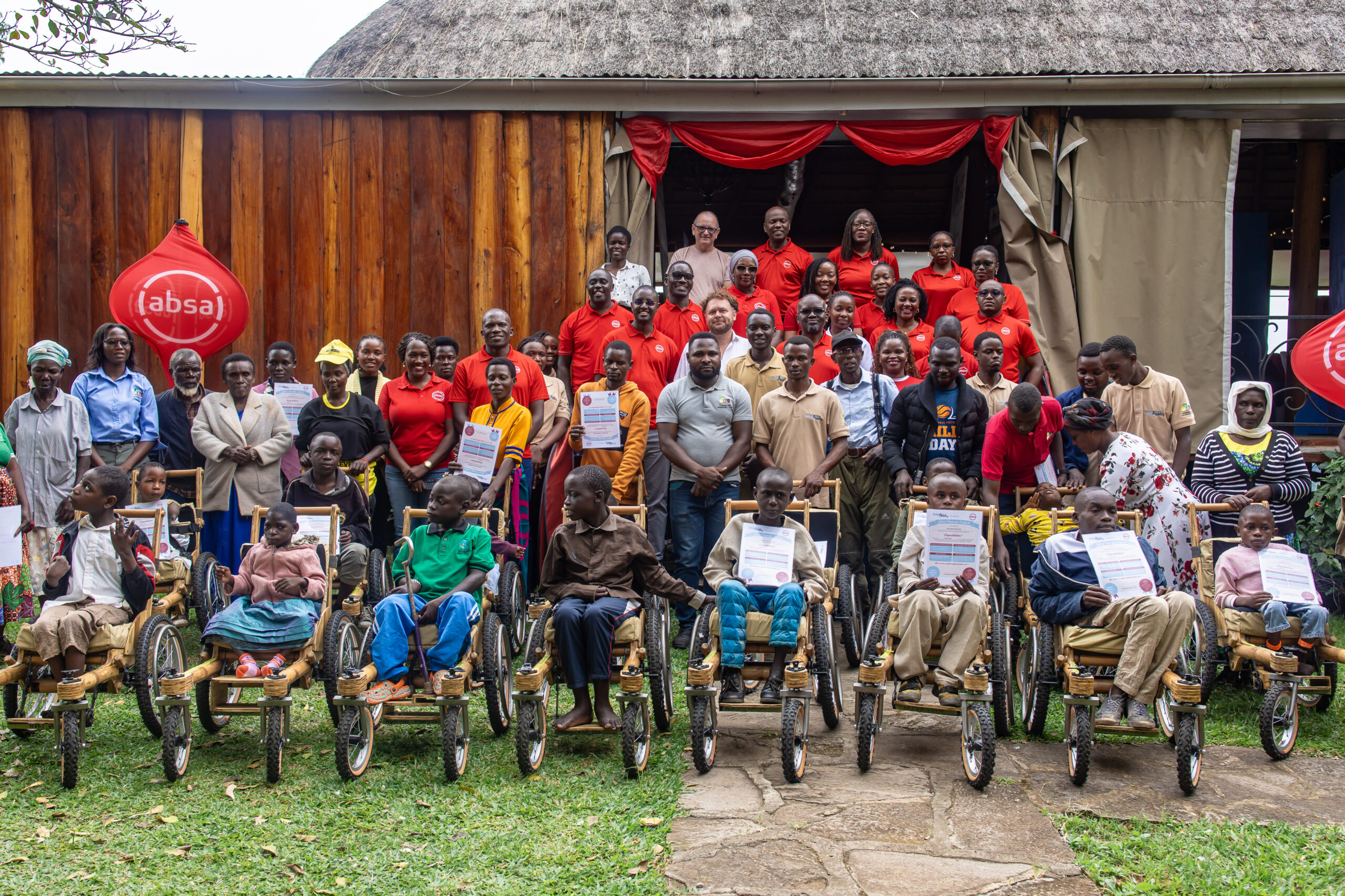 Absa Drives Inclusion with Rwenzori Region Bamboo Wheelchair Donation