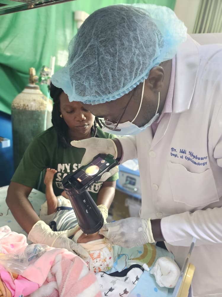 Doctor examines the baby
