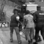 Ronald Mulwana being carried away by security officers