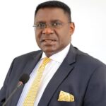 Amb. Henry Mayega